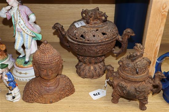 Two Chinese cast iron censers and a bust of Buddha, tallest 24cm